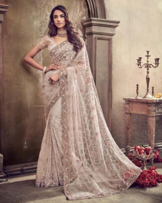 Sonorous Magenta And Beige Net Saree