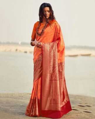 Sonorous Blue And Orange Silk Saree